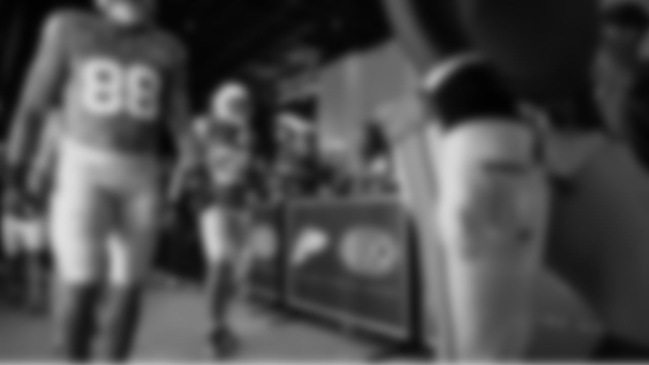 Seahawks safety Ty Okada (39) walks through the Emerald Queen Casino tunnel club at Lumen Field for the Week 5 matchup vs. the Buccaneers.