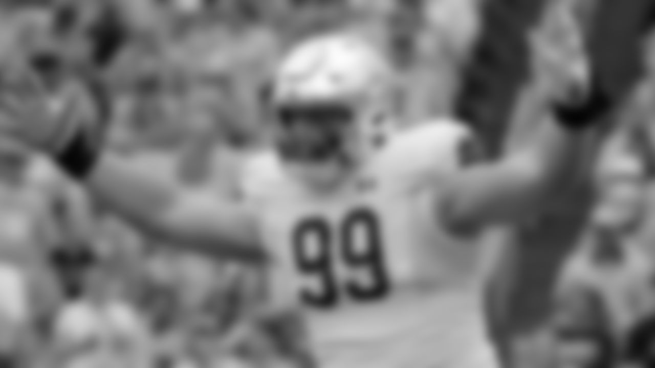 Notre Dame defensive lineman Rylie Mills (99) celebrates after making a quarterback sack during the first half of an NCAA college football game against North Carolina in Chapel Hill, N.C., Saturday, Sept. 24, 2022 (AP Photo/Chris Seward)
