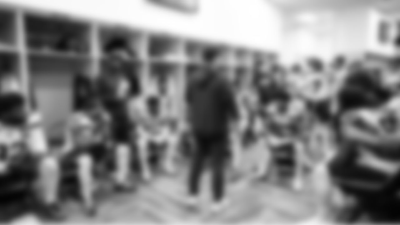 At halftime, Seahawks head coach Mike Macdonald talks to his defensive unit.