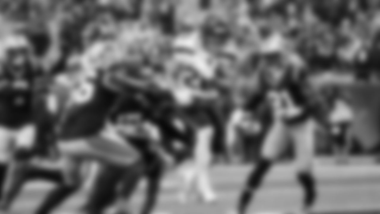 Seahawks running back Zach Charbonnet bulls his way in to the end zone with his second touchdown of the day.