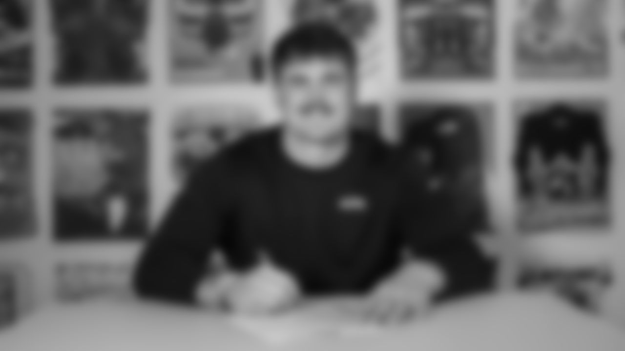 Seahawks guard Grey Zabel (76) signed their rookie contract on May 12, 2025 at the Virginia Mason Athletic Center.