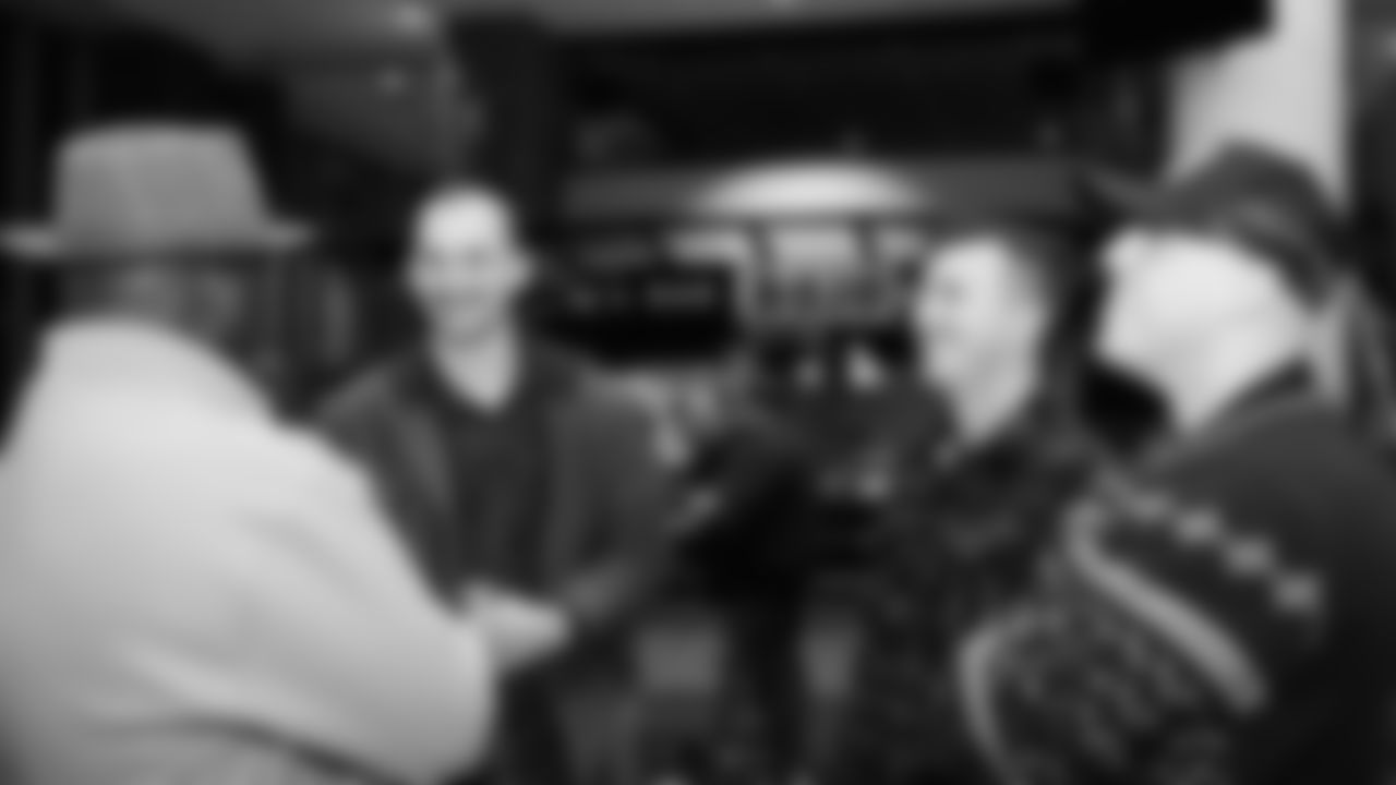 The Seahawks donated $2,500 to the Coast Guard Foundation and surprised 100 service members and their families with Seahawks talent and swag during their holiday event on December 11, 2025.