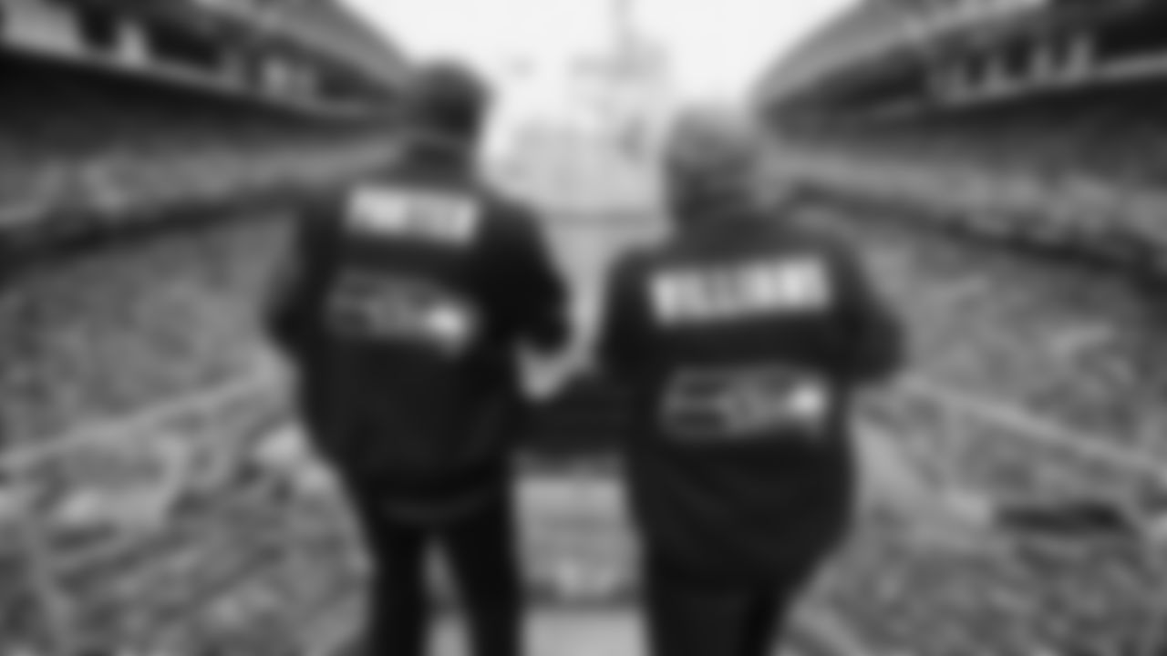 Seahawks Legends Rufus Porter and John L. Williams raise 12 flag in week 15 on December 14, 2025