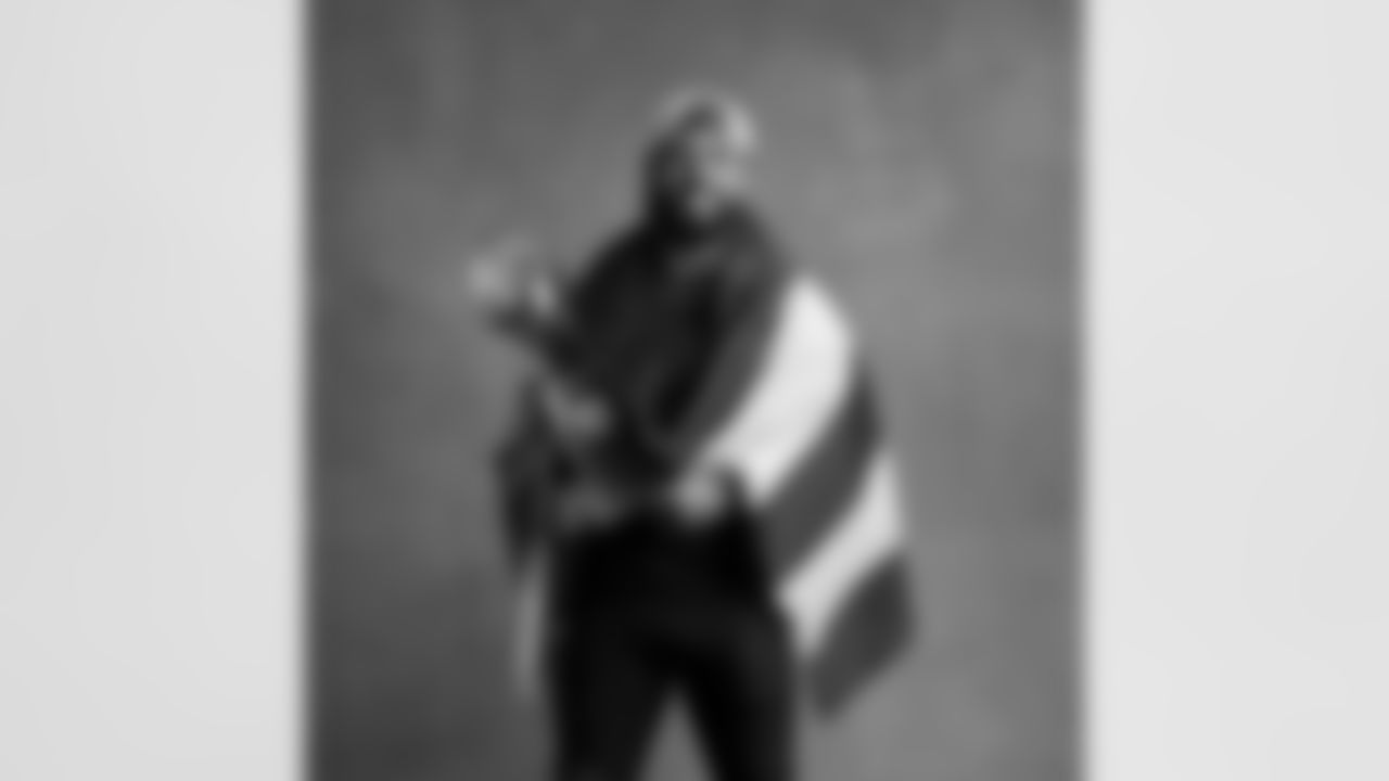 Seahawks safety Julian Love (20) with the Lombardi Trophy after winning Super Bowl LX.