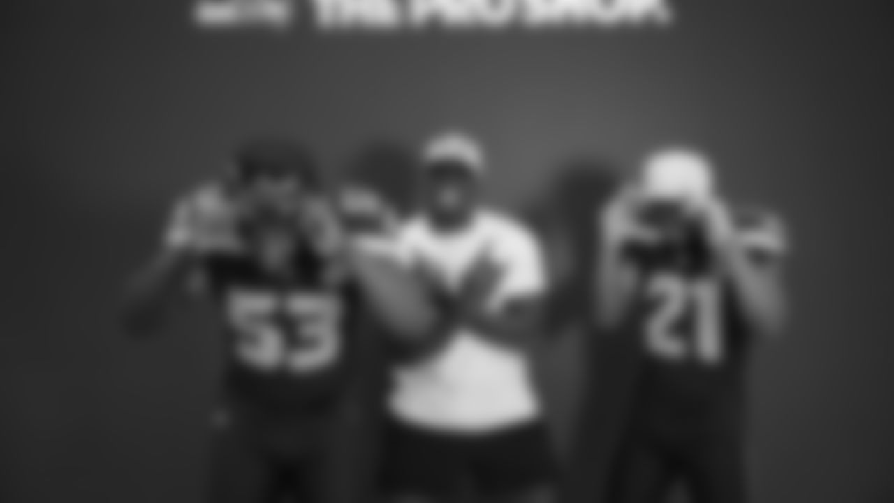 Seahawks linebacker Boye Mafe (53), linebacker Derick Hall (58) and cornerback Devon Witherspoon (21) at Seahawks media day on June 9, 2025