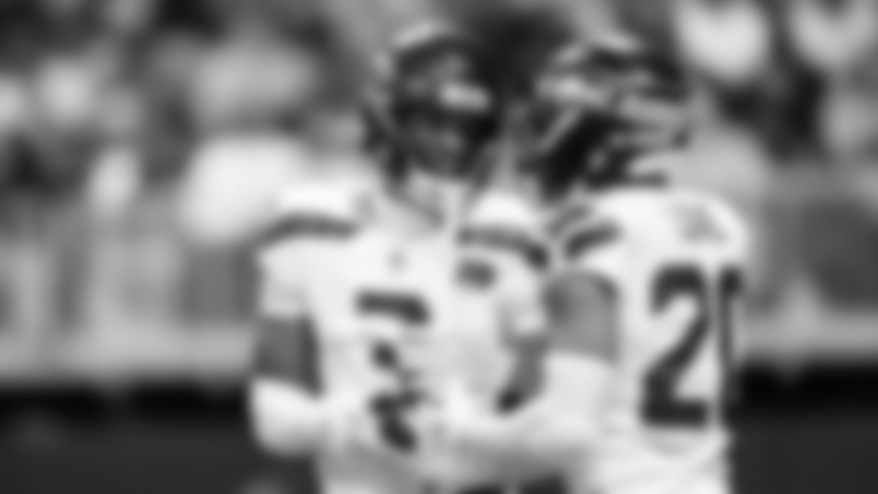 Seahawks safeties Nick Emmanwori and Julian Love celebrate after Emmanwori's third quarter interception.