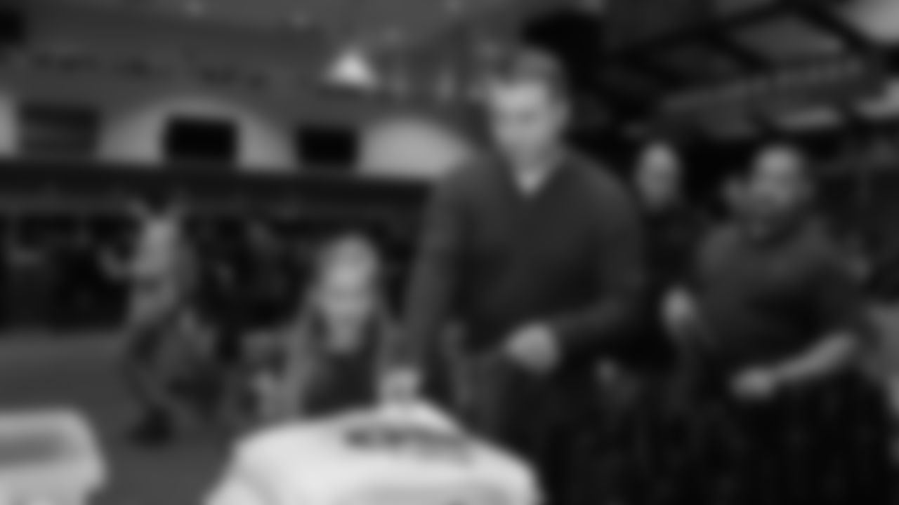 The Seahawks donated $2,500 to the Coast Guard Foundation and surprised 100 service members and their families with Seahawks talent and swag during their holiday event on December 11, 2025.