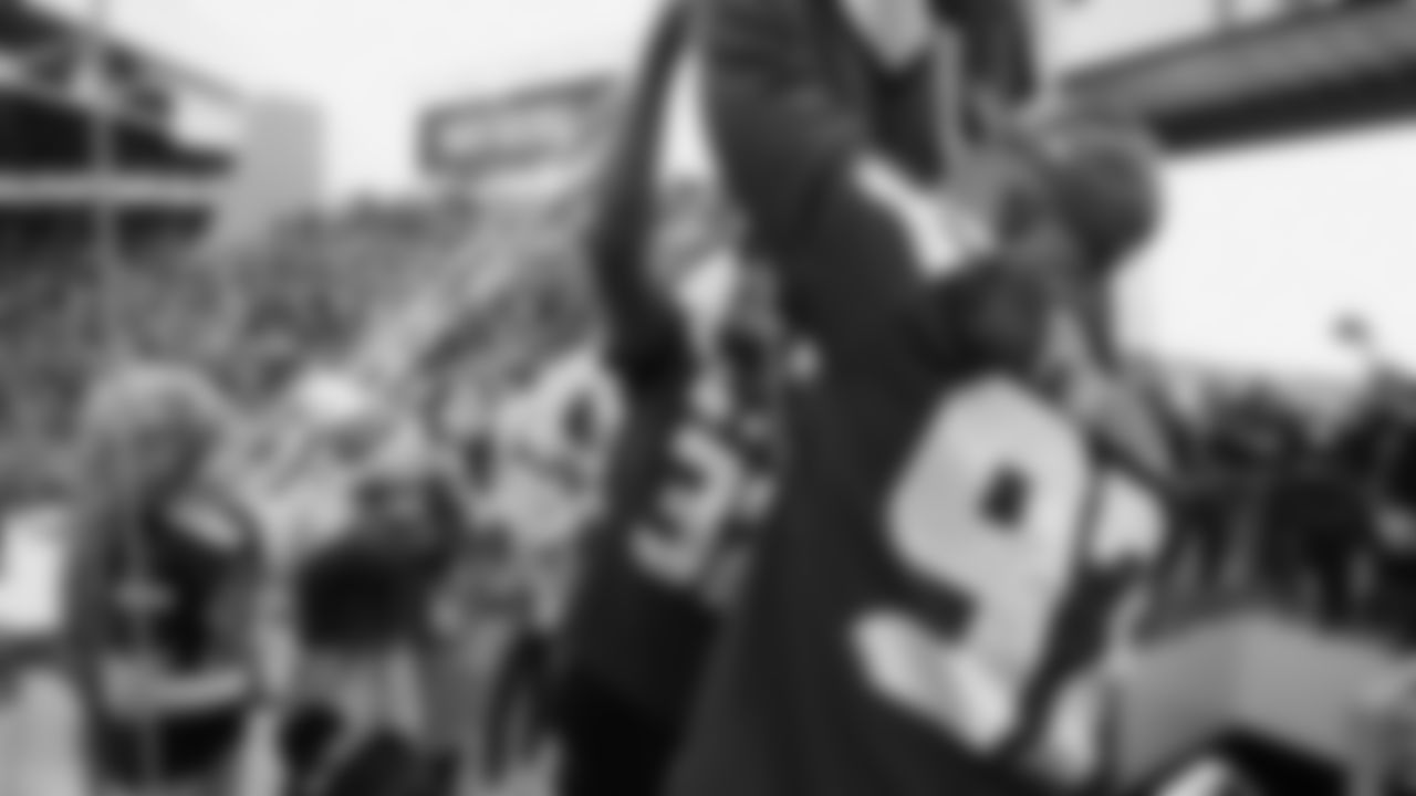 Seahawks Legends Rufus Porter and John L. Williams raise 12 flag in week 15 on December 14, 2025