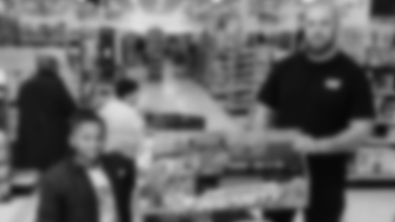 Seahawks offensive lineman Josh Jones was joined by fellow offensive linemen as they hosted a holiday shopping spree for kids from the Boys & Girls Club on December 9, 2025.