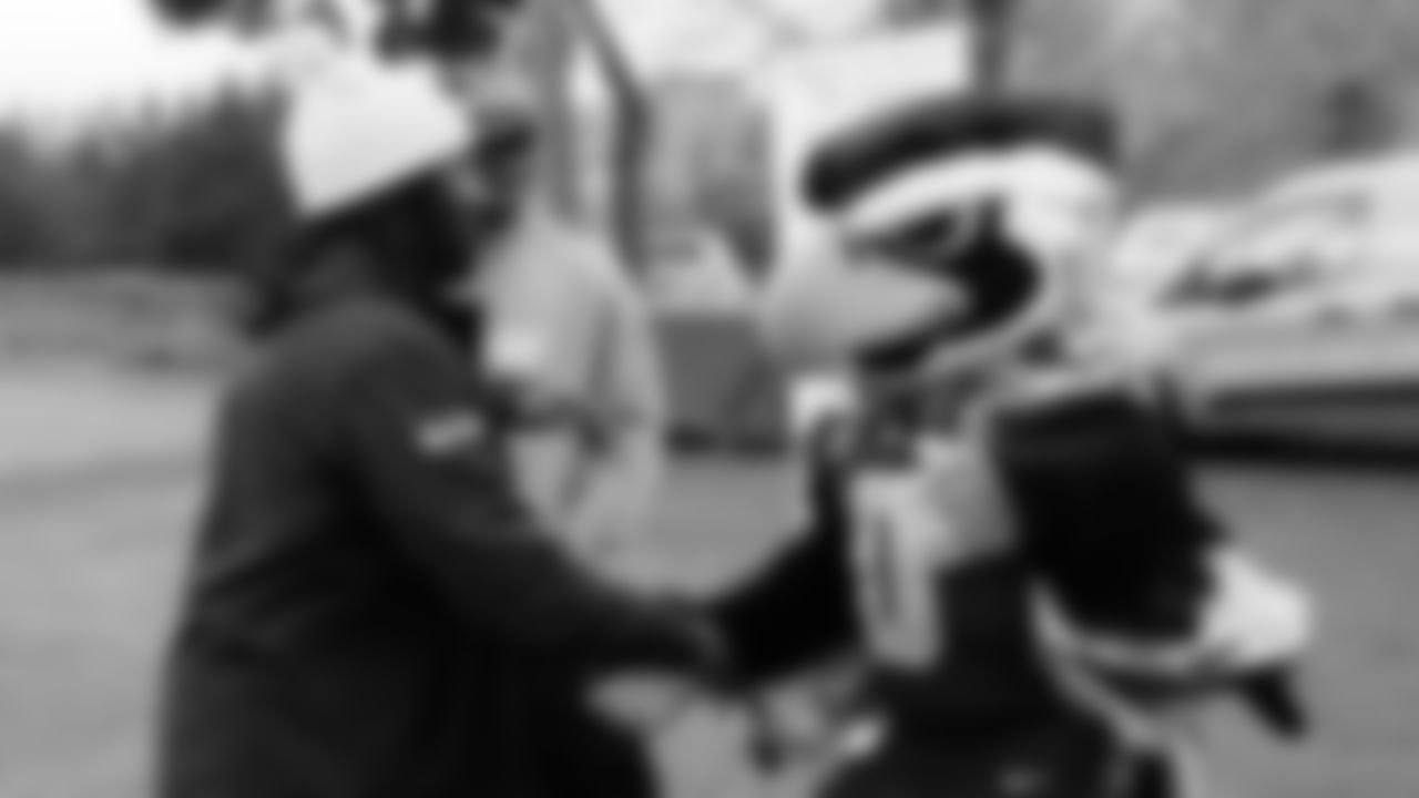 Seahawks Legend Marcus Trufant, quarterback Jalen Milroe, Blitz and the Seahawks Dancers participated in the Tacoma Police Department and Friends Thanksgiving Turkey Giveaway on November 18, 2025.