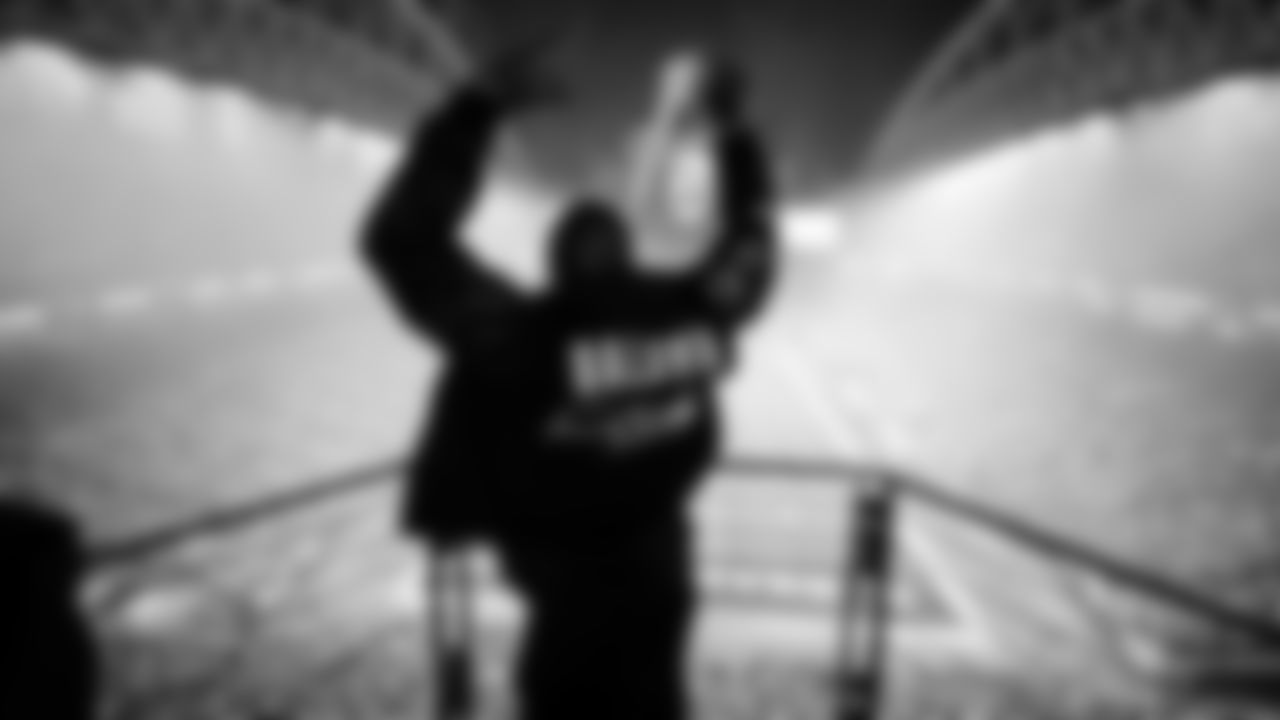 Seahawks Legend Doug Baldwin raising the flag in the 2025 Divisional Round on January 17, 2025.