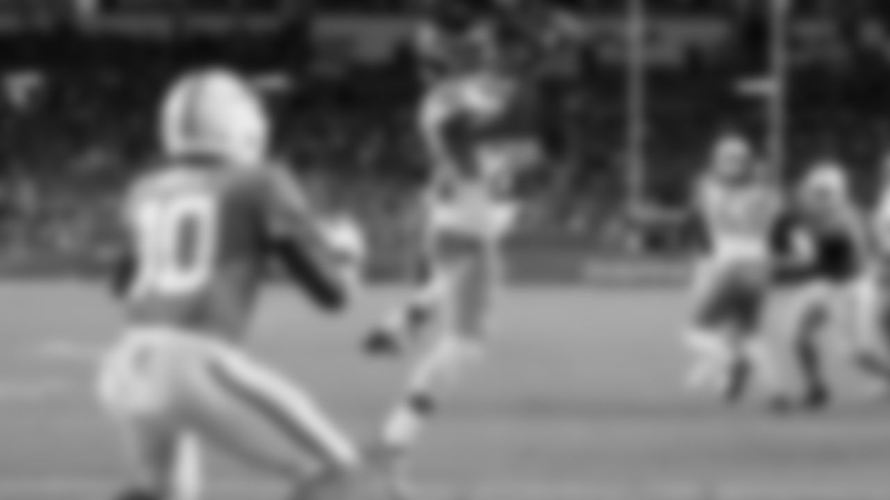 Tennessee Titans safety Quandre Diggs (28) intercepts a pass in the endzone intended for Miami Dolphins wide receiver Tyreek Hill (10) during the second half of an NFL football game, Monday, Sept. 30, 2024, in Miami Gardens, Fla. (AP Photo/Rebecca Blackwell)