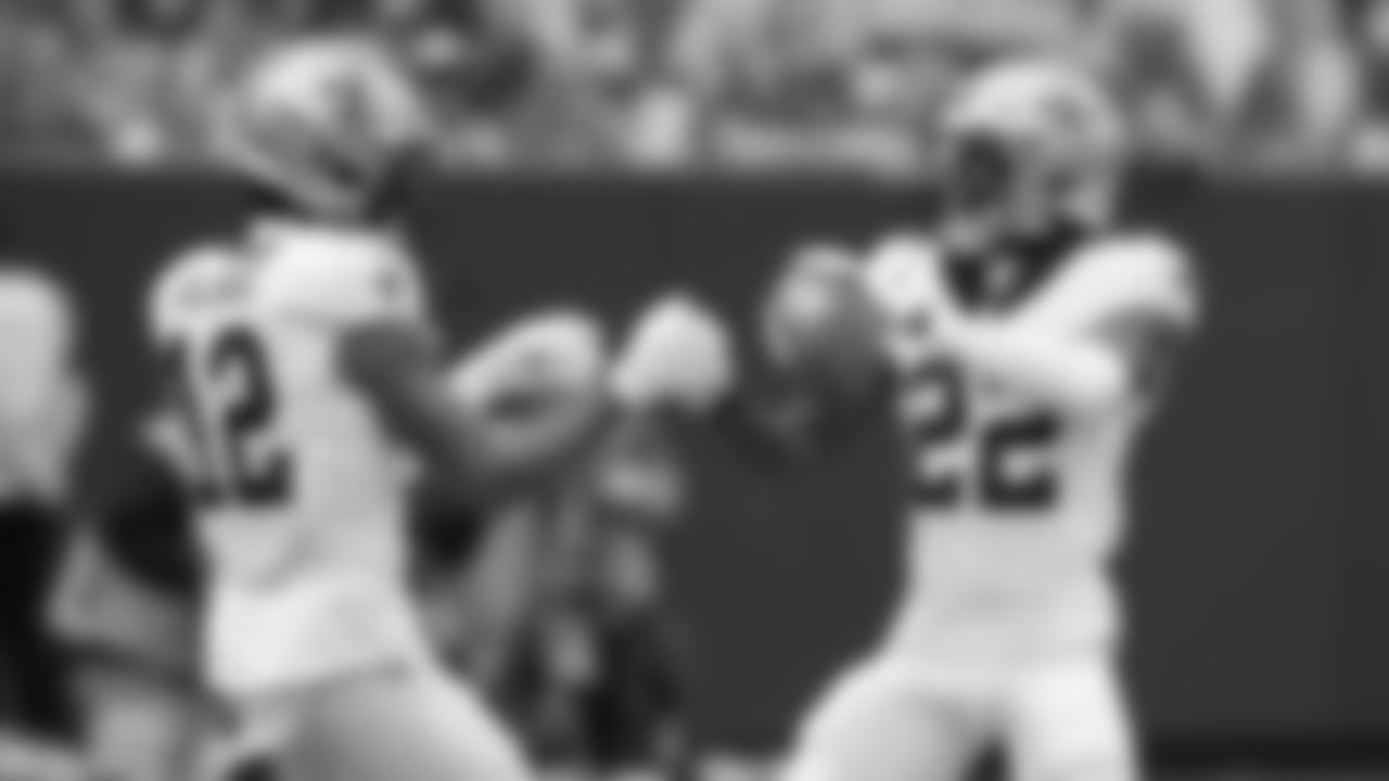 New Orleans Saints wide receiver Chris Olave (12) and New Orleans Saints wide receiver Rashid Shaheed (22) celebrate a play during an NFL football game against the Green Bay Packers, Sunday, Sept 24, 2023 in Green Bay, Wisconsin. The Packers defeated the Saints 18-17. (Todd Rosenberg via AP)