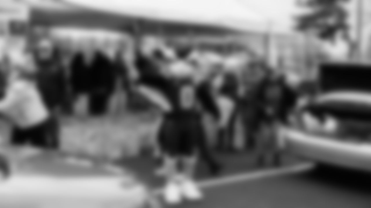 Seahawks Legend Marcus Trufant, quarterback Jalen Milroe, Blitz and the Seahawks Dancers participated in the Tacoma Police Department and Friends Thanksgiving Turkey Giveaway on November 18, 2025.