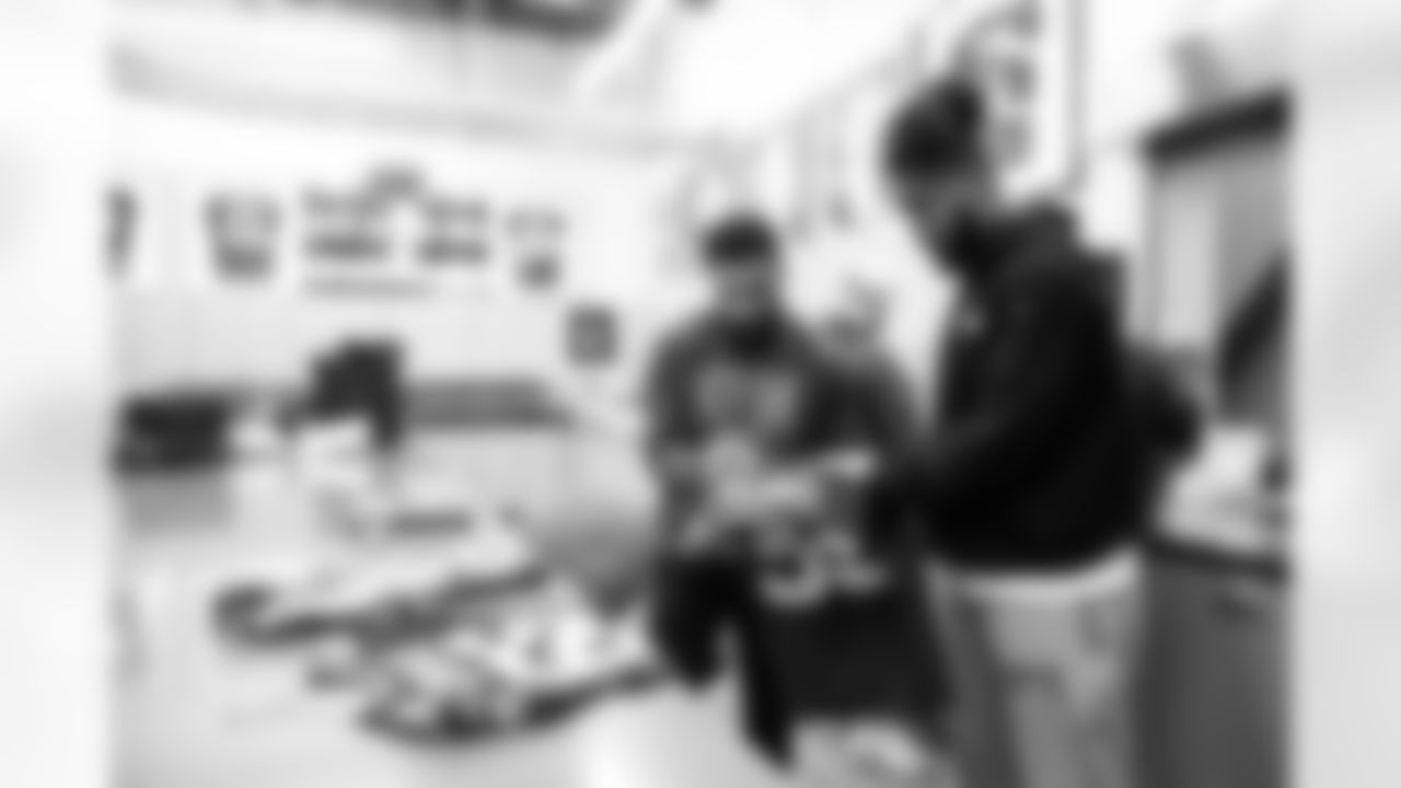Seahawks safety Julian Love (20) and linebacker Tyreke Smith (59) in the locker room following the end of the 2024 season on Monday, January 6, 2025.