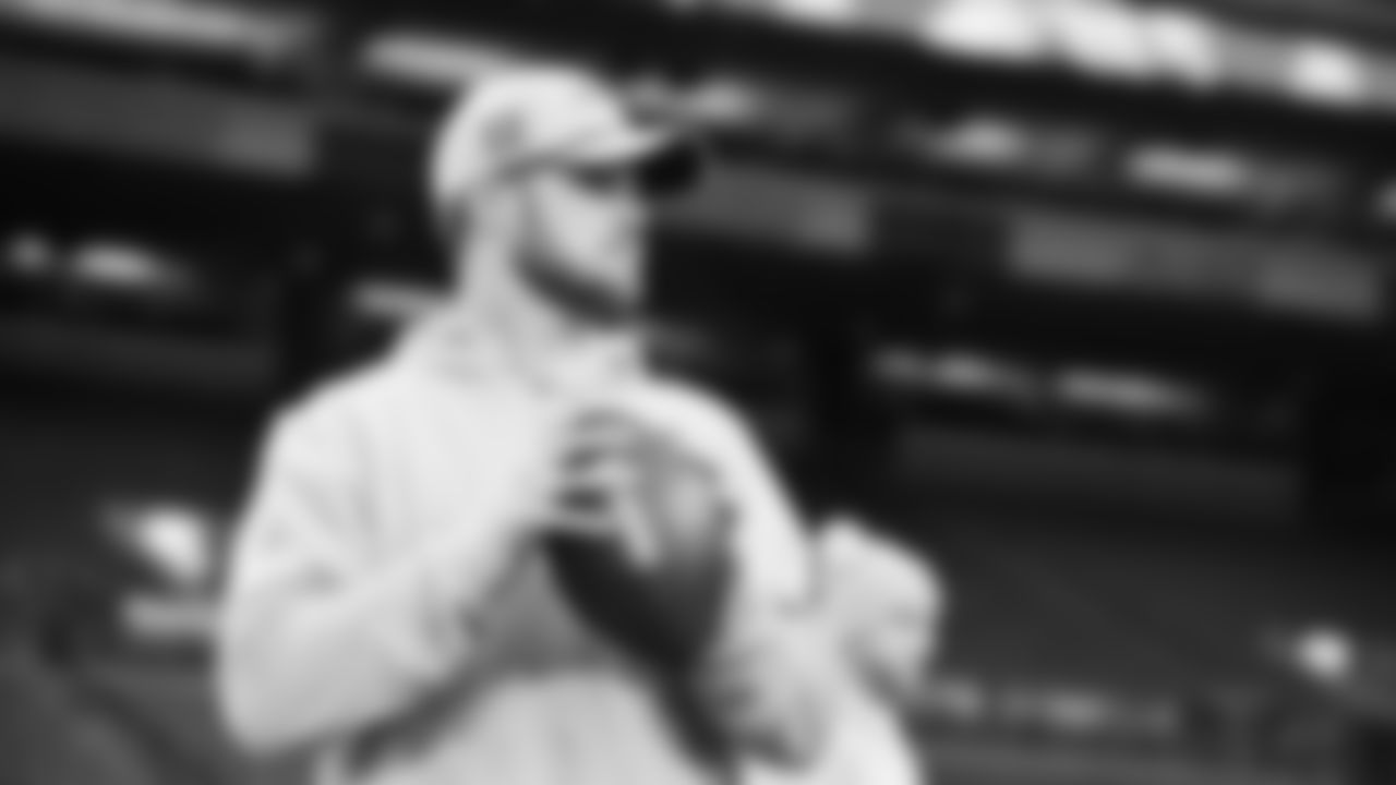 Seahawks quarterback Sam Darnold (14) warms up at Lumen Field for the Week 16 matchup vs. the L.A. Rams.