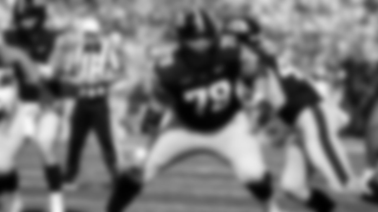Iowa offensive lineman Mason Richman (78) looks to make a block during the first half of an NCAA college football game against Washington, Saturday, Oct. 12, 2024, in Iowa City, Iowa. (AP Photo/Charlie Neibergall)