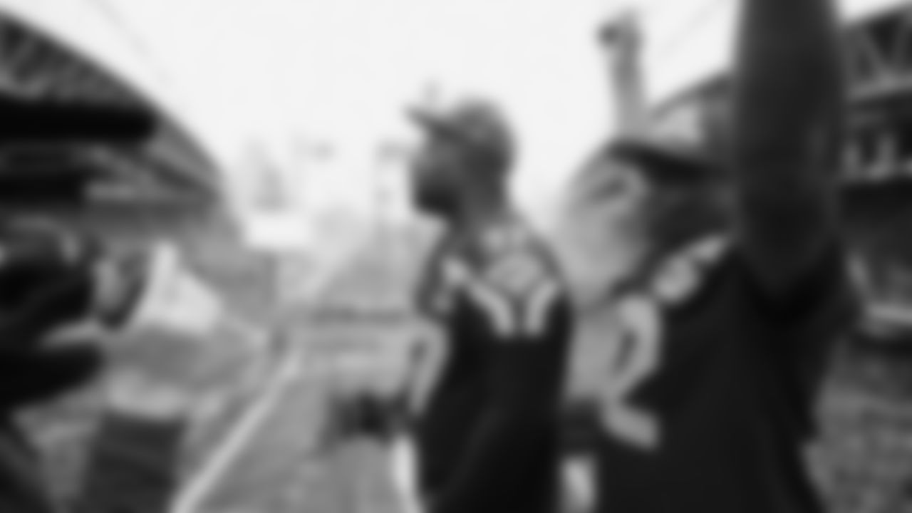 Seahawks Legends Rufus Porter and John L. Williams raise 12 flag in week 15 on December 14, 2025