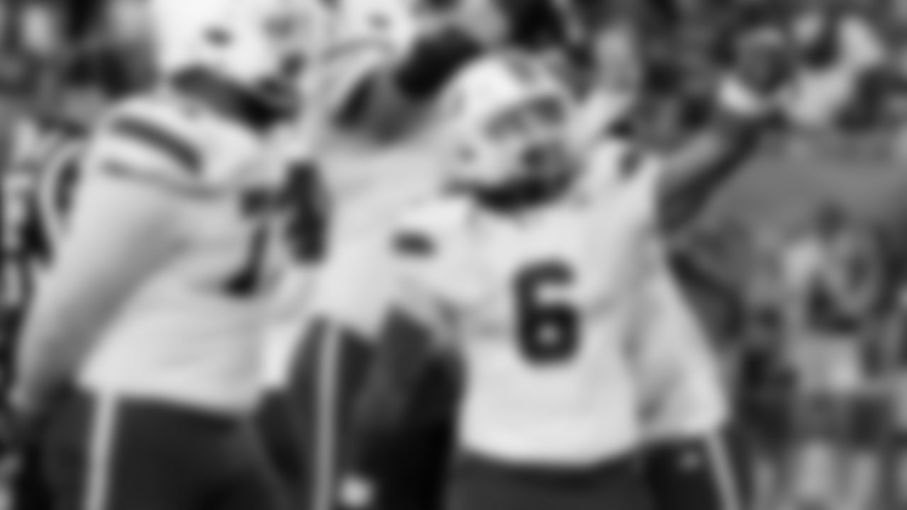 Miami running back Damien Martinez (6) celebrates after scoring against South Florida during the first half of an NCAA college football game Saturday, Sept. 21, 2024, in Tampa, Fla. (AP Photo/Chris O'Meara)