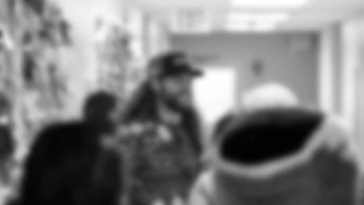 Seahawks Fullback Brady Russell, the Seahawks Dancers, and Blitz spent the day volunteering at Santa's Castle on Joint Base Lewis-McChord to celebrate the holidays and support service members and their families.