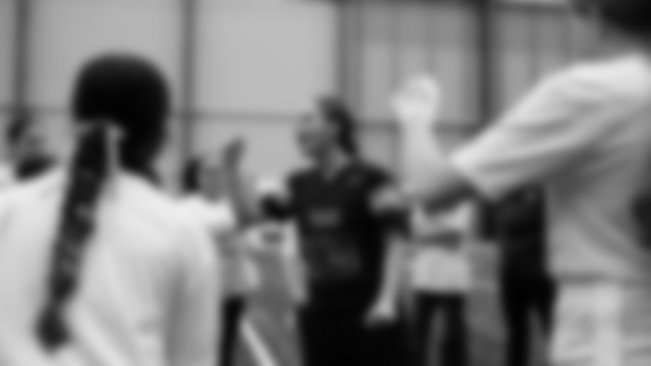 The Seahawks Women's Association packed girls flag kits and hosted a free girls flag football camp at the Seahawks training facility on Saturday, November 8, 2025.