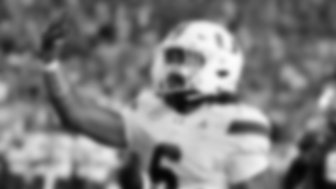 Miami running back Damien Martinez celebrates after scoring against South Florida during the second half of an NCAA college football game Saturday, Sept. 21, 2024, in Tampa, Fla. (AP Photo/Chris O'Meara)