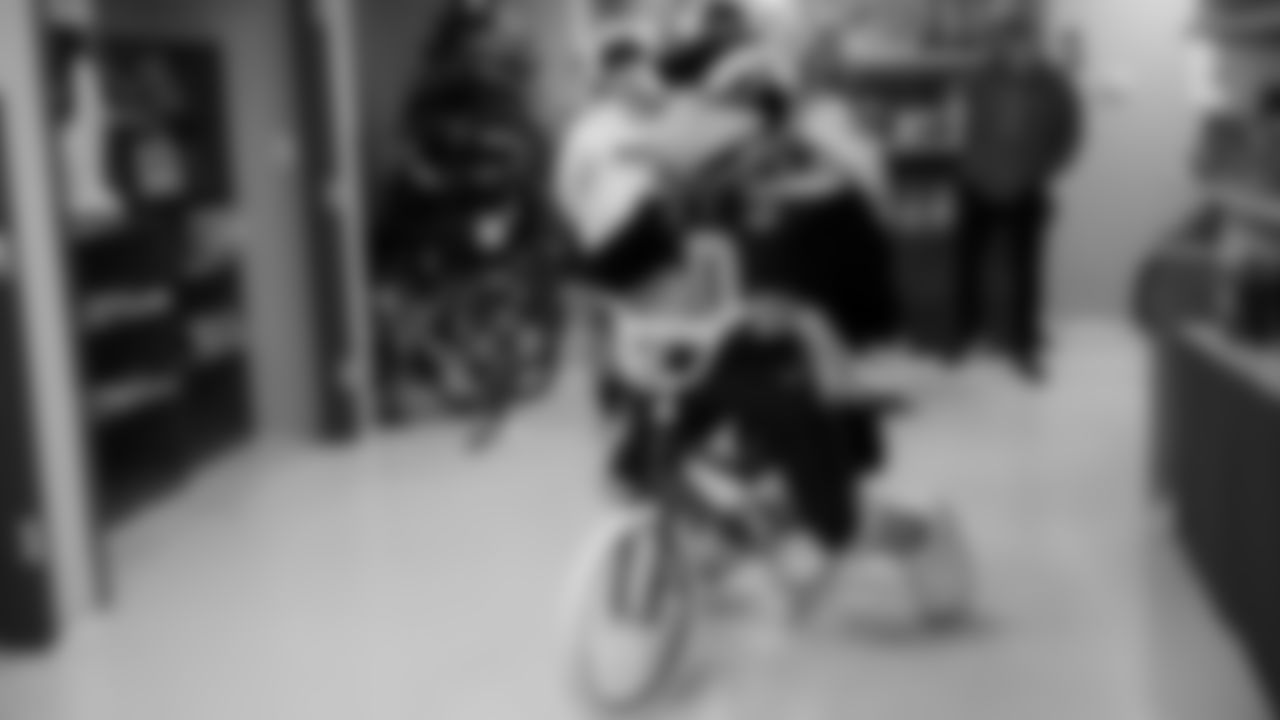 Seahawks Fullback Brady Russell, the Seahawks Dancers, and Blitz spent the day volunteering at Santa's Castle on Joint Base Lewis-McChord to celebrate the holidays and support service members and their families.