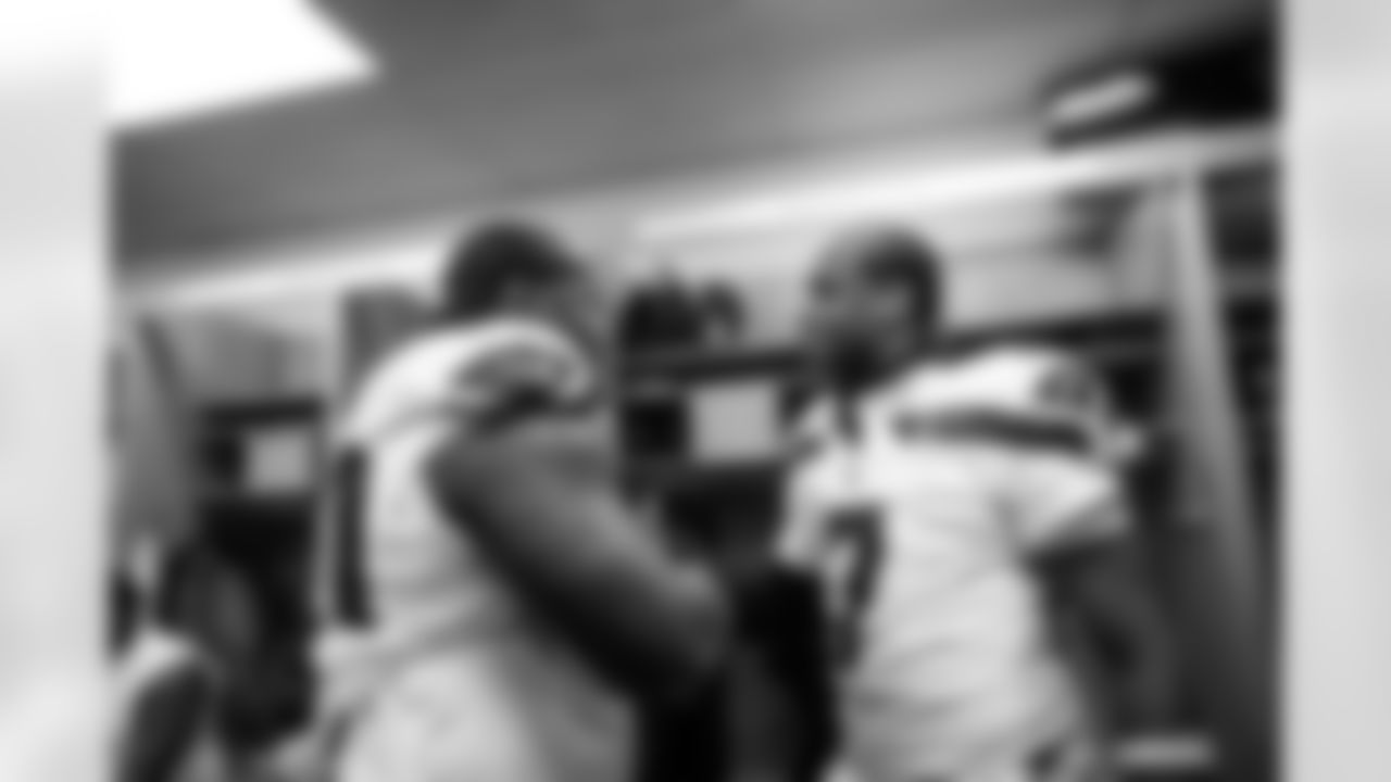 Seahawks quarterback Geno Smith (7) and nose tackle Jarran Reed (90) celebrate the Week 17 win over the Chicago Bears on Thursday, December 27, 2024.