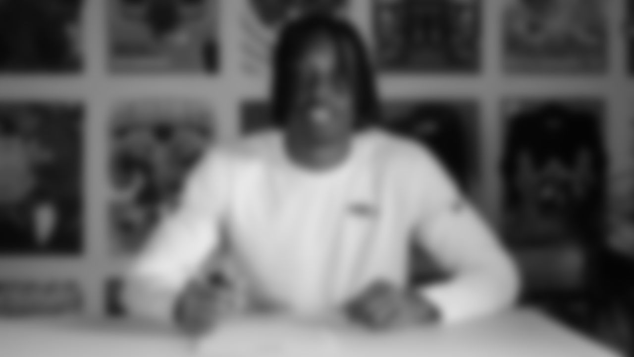 Seahawks wide receiver Ricky White III (86) signed his rookie contract on May 12, 2025 at the Virginia Mason Athletic Center.