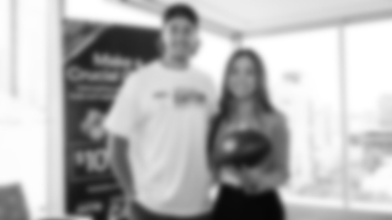 Seahawks wide receiver Jake Bobo presented the official game ball to Virginia Mason Franciscan Health on October 28, 2025.