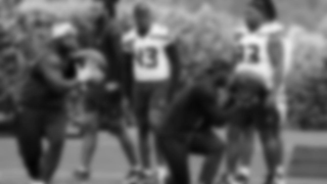 Seahawks defensive tackle Jarran Reed (90) and linebacker Derick Hall (58) participated in a workout on May 14, 2025 at the Virginia Mason Athletic Center.