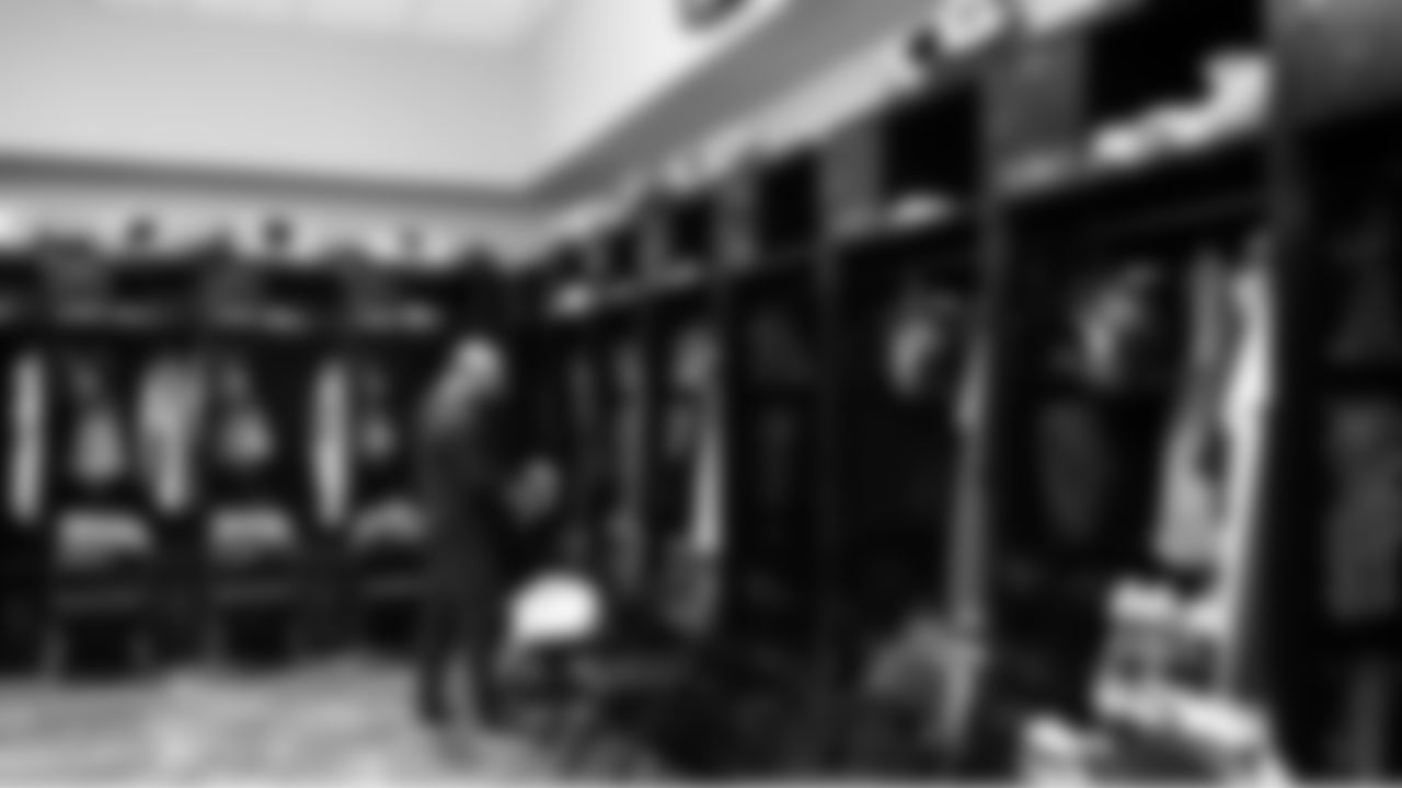 Upon arrival in Jacksonville Seahawks assistant equipment manager Derin Lazuta and other staff members readied the locker room for the game.