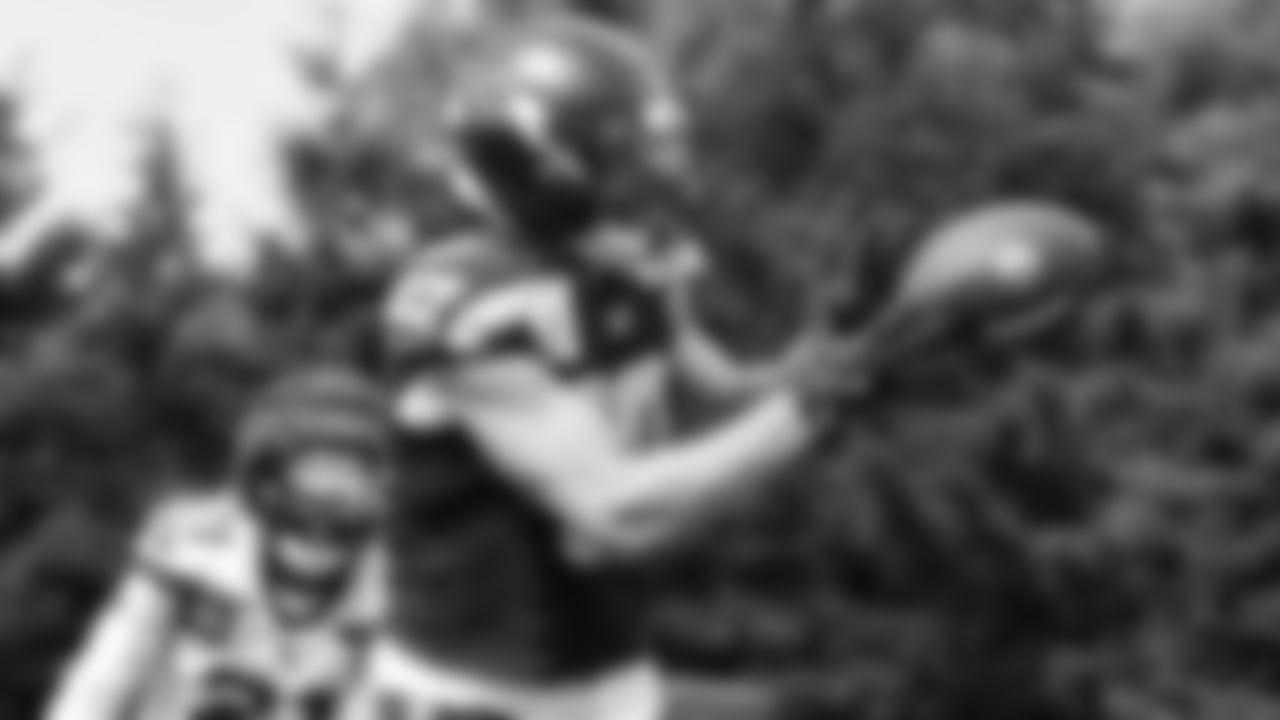 Seahawks wide receiver Cooper Kupp (10) and cornerback Devon Witherspoon (21) practiced on August 4, 2025 at the Virginia Mason Athletic Center.