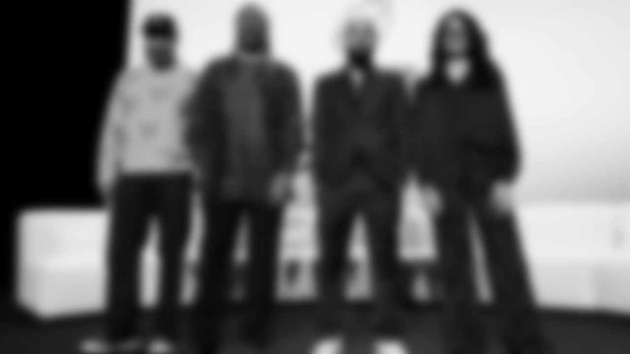 Apple Music's Ebro Darden poses for a photo with ASL interpreters Fred Beam, Julian Ortiz, and Celimar Cosme at the Apple Music Halftime Show press conference ahead of the Super Bowl 60 football game on Thursday, February 5, 2026 in San Francisco. (Kathryn Riley/NFL)