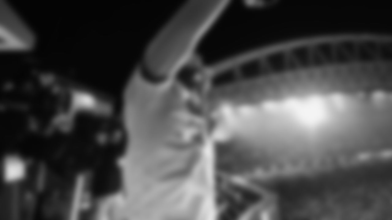 Seahawks Legends Chad Brown and Darrell Jackson raise the flag before the Week 16 Rivalries matchup against the Rams on December 18th, 2025