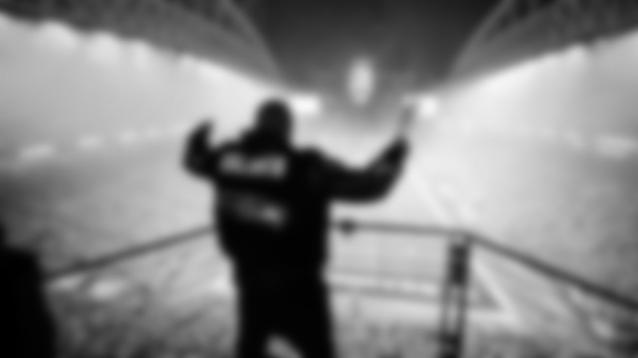 Seahawks Legend Doug Baldwin raising the flag in the 2025 Divisional Round on January 17, 2025.