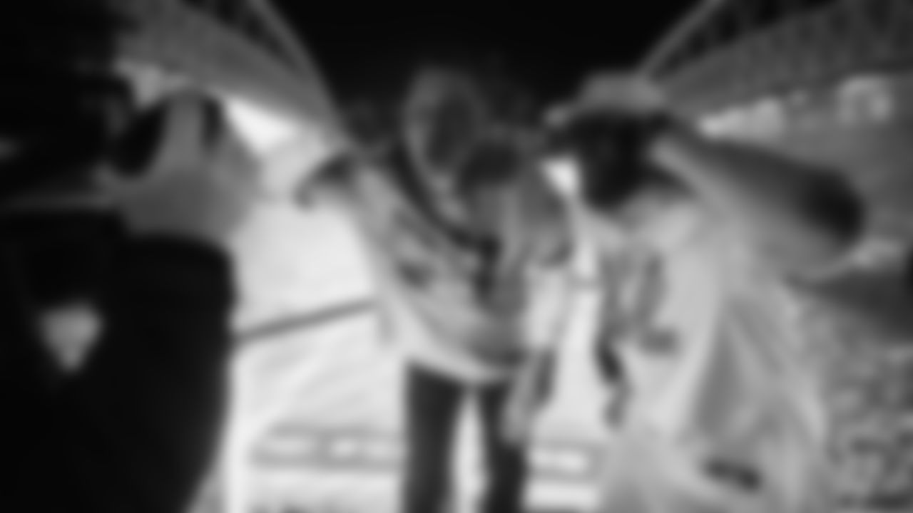 Seahawks Legends Chad Brown and Darrell Jackson raise the flag before the Week 16 Rivalries matchup against the Rams on December 18th, 2025