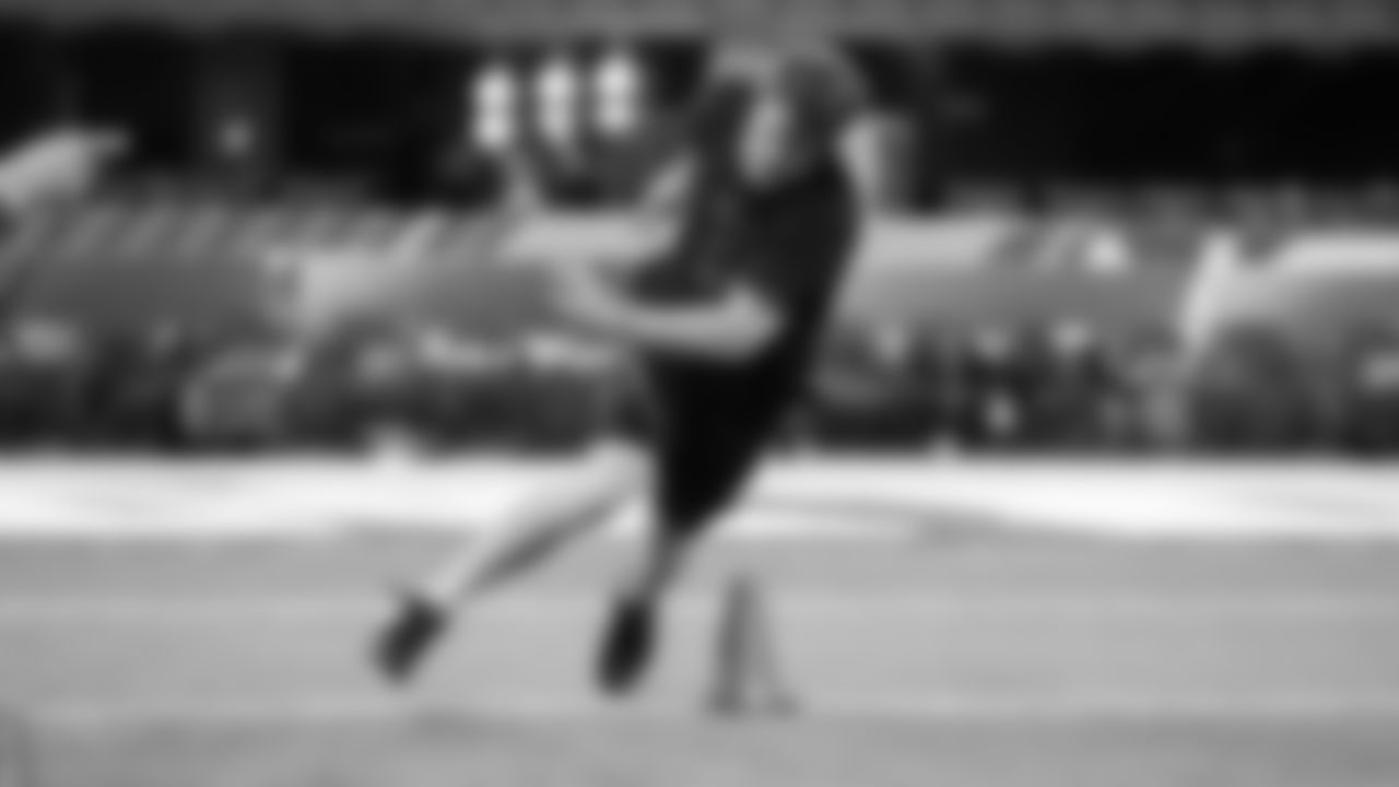 Southern California quarterback Sam Darnold runs a drill during the 2018 NFL Scouting Combine on Saturday, March 3, 2018 in Indianapolis. (Ben Liebenberg via AP)