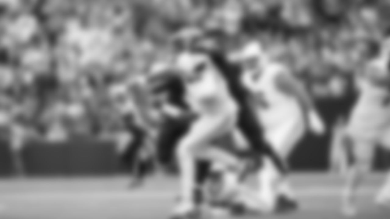 Seahawks linebacker Tyrice Knight forces his second fumble of the game as he hits Cardinals quarterback Jacoby Brissett.