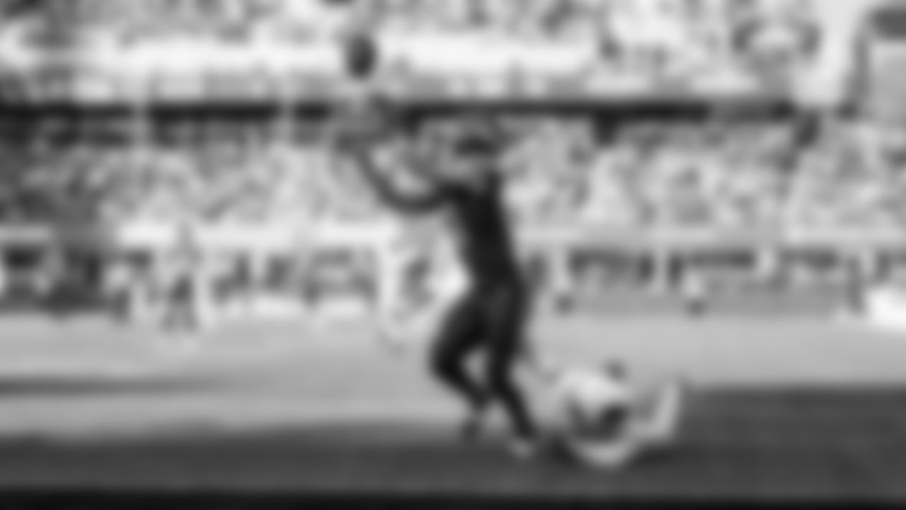 Seahawks receiver Jaxon Smith-Njigba hauls in a 43-yard touchdown pass from quarterback Sam Darnold on the team's opening drive.