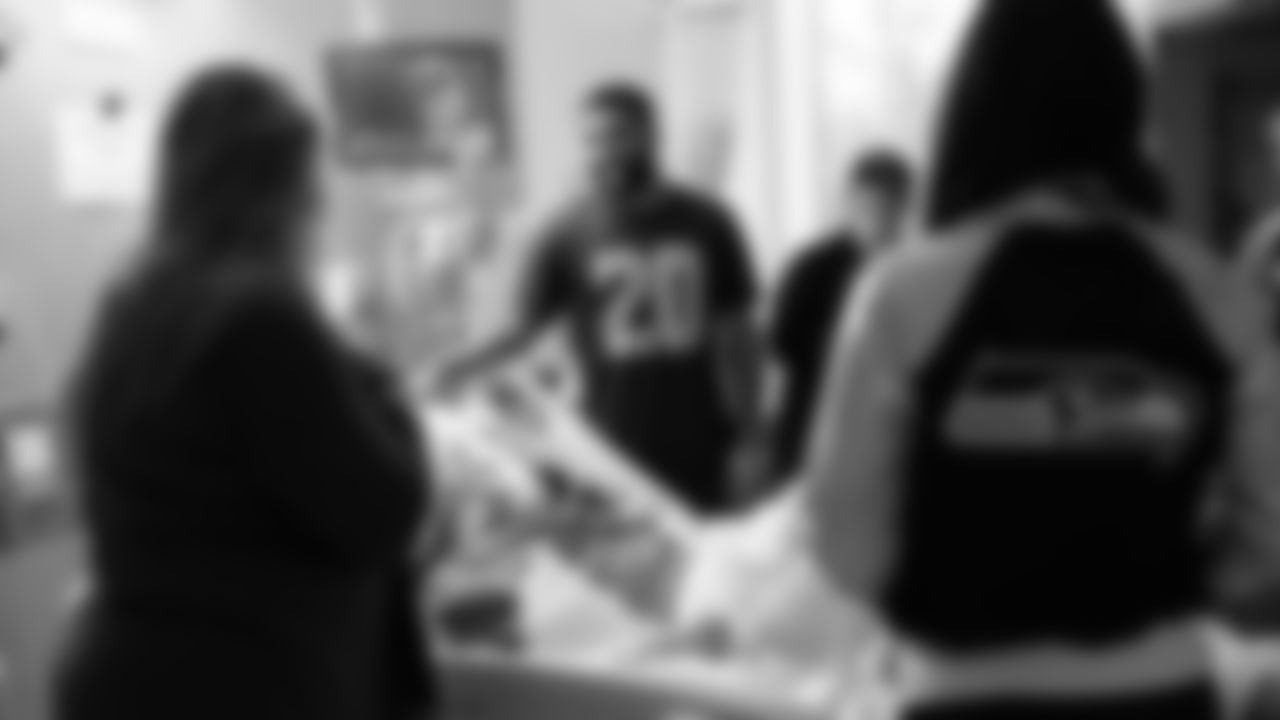 Seahawks Safety Julian Love and the Seahawks Dancers brought holiday spirit to Virginia Mason Medical Center's Critical Care Unit, visiting heart surgery patients and sharing encouragement during recovery.