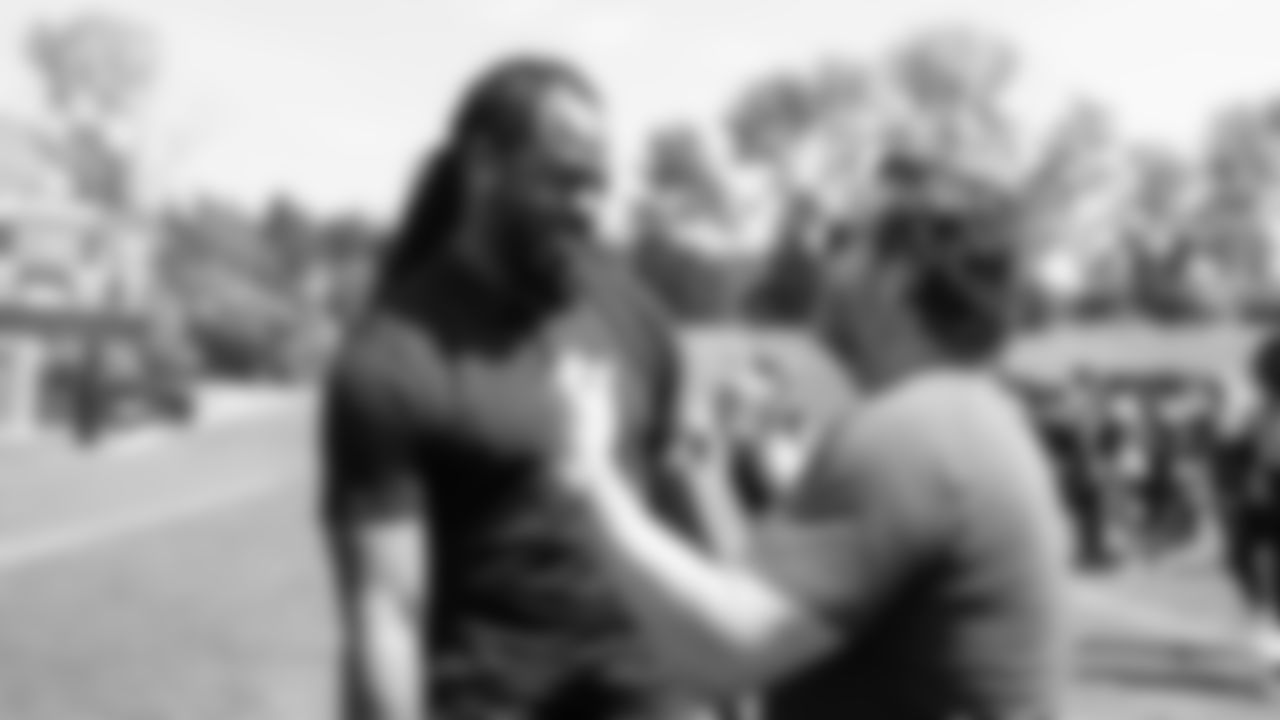 Seahawks Legend Richard Sherman with president of football operations/general manager John Schneider on day two of minicamp on Wednesday, June 11, 2025 at the Virginia Mason Athletic Center.