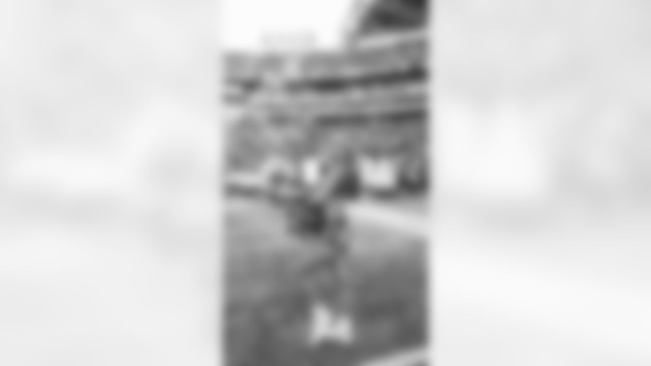 Lillian cheering on the Seahawks as they take the field for the first time.