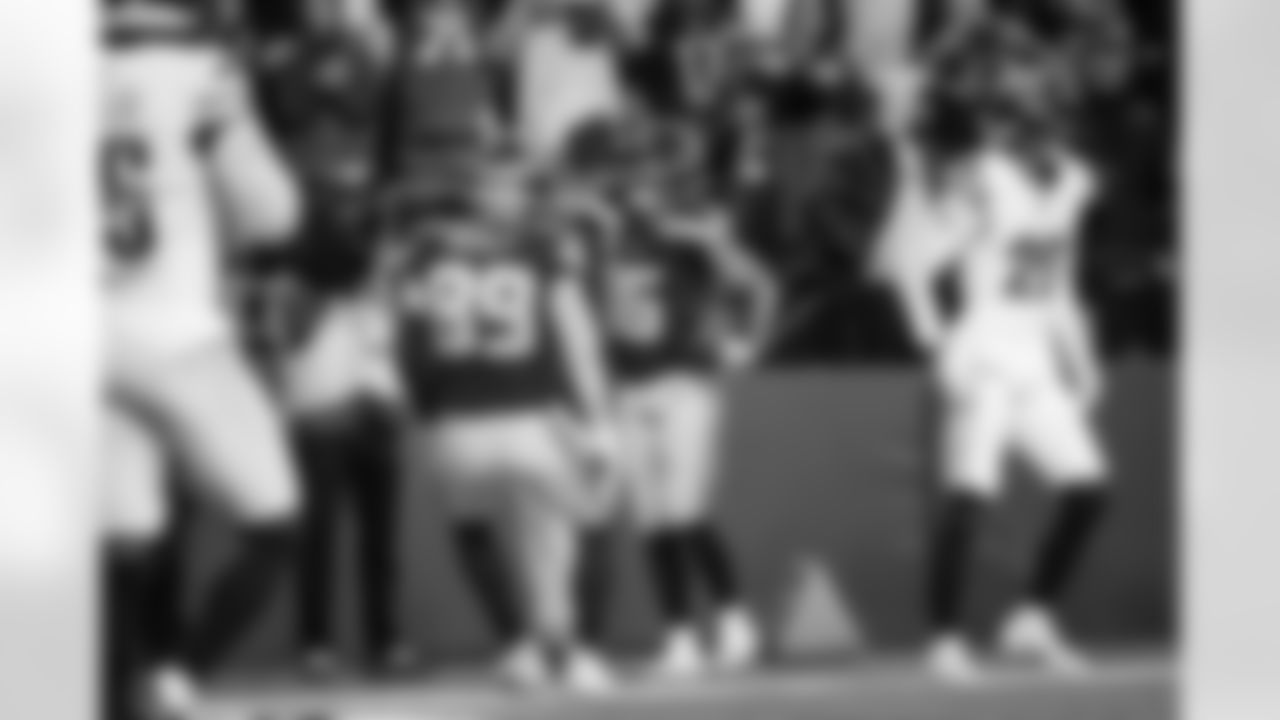 Seahawks receiver Tyler Lockett salutes in honor of both active military members and veterans after he scored a touchdown in the fourth quarter.