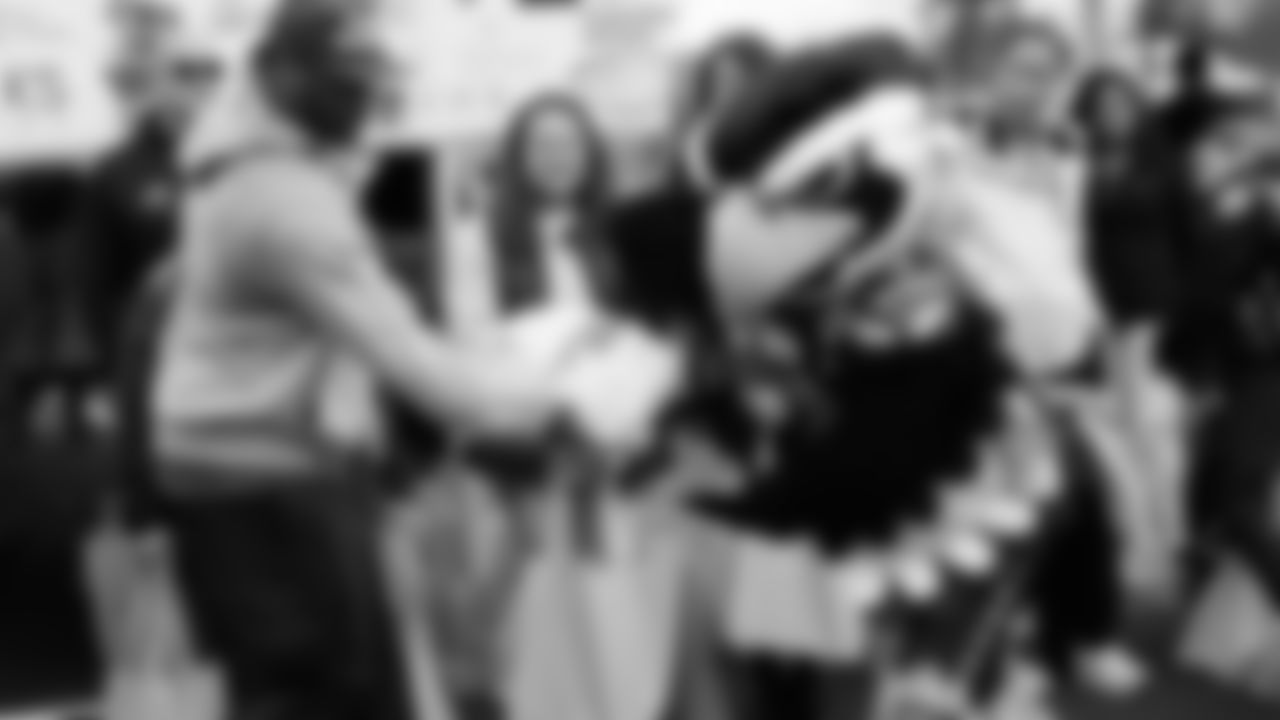 Seahawks Legend Marcus Trufant, quarterback Jalen Milroe, Blitz and the Seahawks Dancers participated in the Tacoma Police Department and Friends Thanksgiving Turkey Giveaway on November 18, 2025.