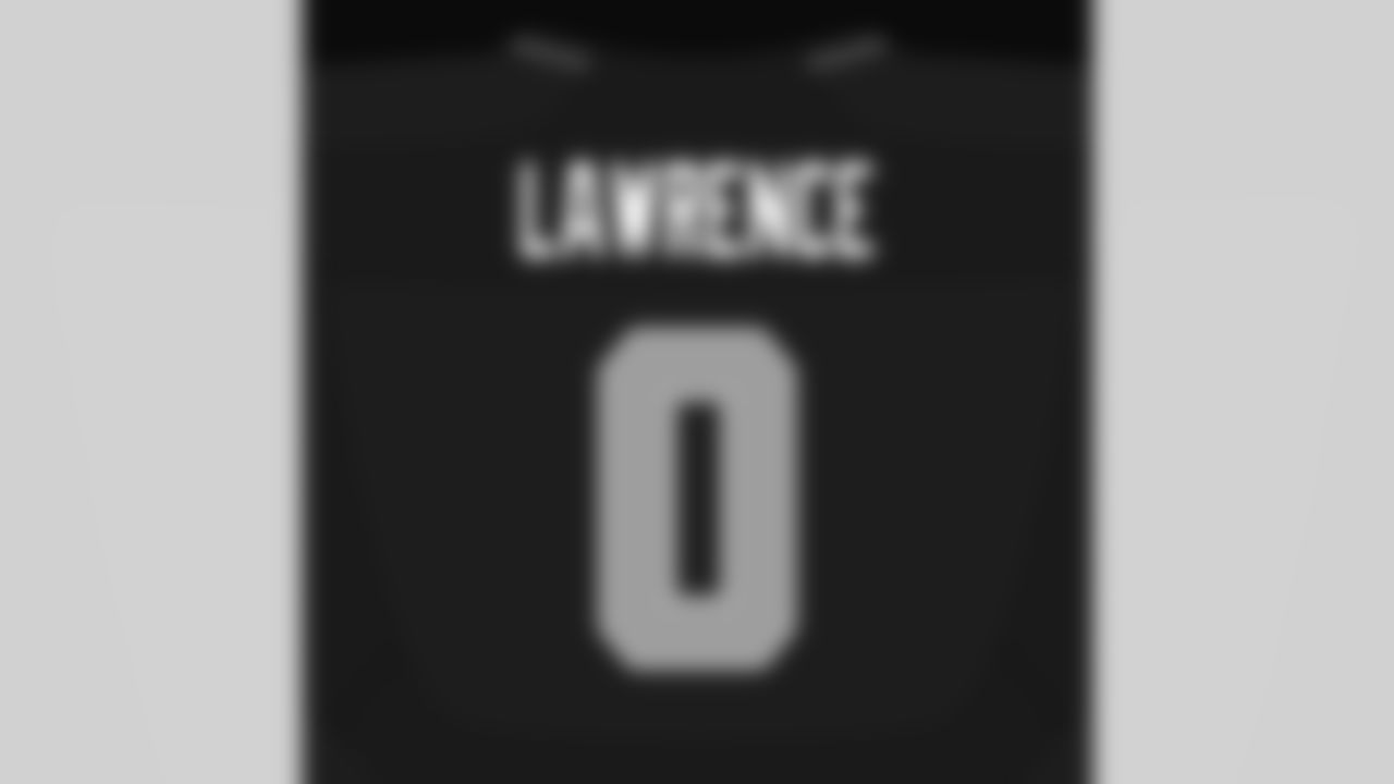 Seahawks defensive end DeMarcus Lawrence (0).