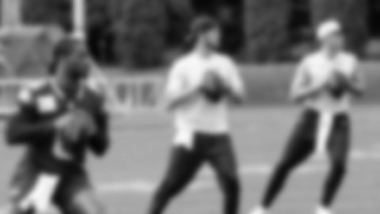 Seahawks quarterback Jalen Milroe (6), quarterback Sam Darnold (14) and quarterback Drew Lock (2) participated in a workout on May 12, 2025 at the Virginia Mason Athletic Center.