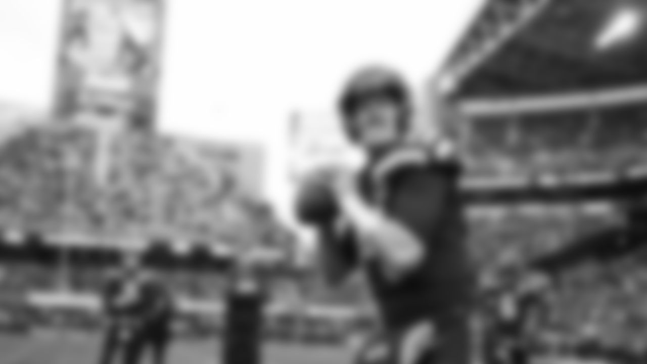 Seahawks quarterback Sam Darnold (14) warms up at Lumen Field for the Week 15 matchup vs. the Indianapolis Colts.