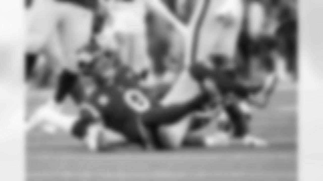 Rams quarterback Matthew Stafford reacts after absorbing a big hit from Seahawks defensive lineman Mario Edwards. Seahawks cornerback Riq Woolen intercepted the pass thrown by Stafford.