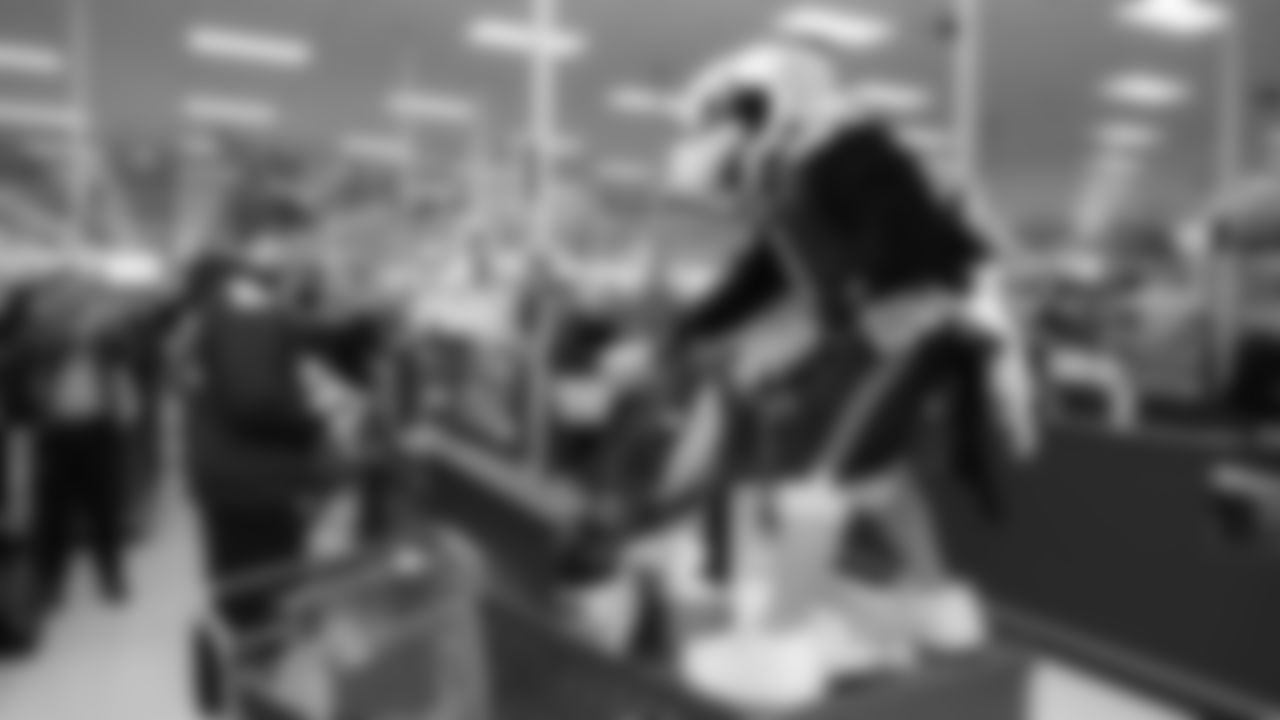 Seahawks offensive lineman Josh Jones was joined by fellow offensive linemen as they hosted a holiday shopping spree for kids from the Boys & Girls Club on December 9, 2025.